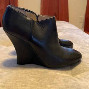 Black wedge booties